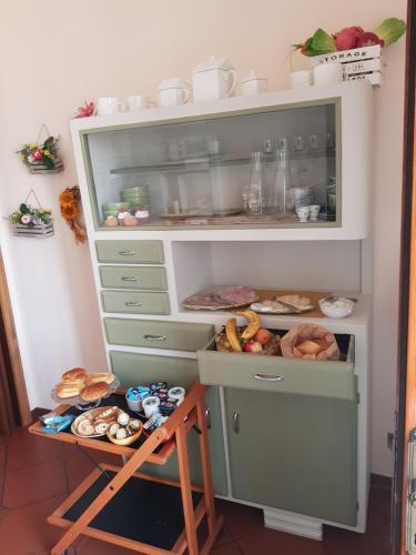 Kuchyň nebo kuchyňský kout v ubytování B&B Via della Grotta