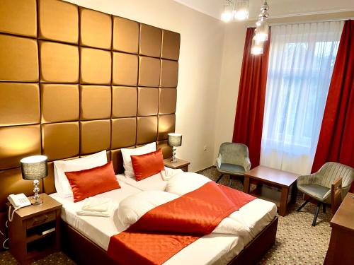 Letto o letti in una camera di Borostyán Panzió