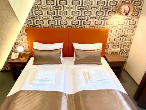 Letto o letti in una camera di Borostyán Panzió