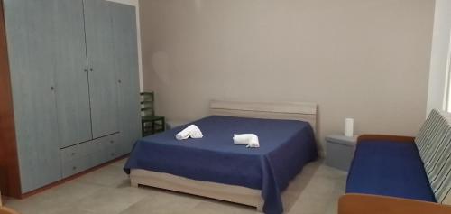 Posteľ alebo postele v izbe v ubytovaní LaTavernapartment
