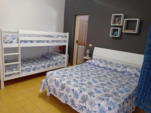 Krevet ili kreveti u jedinici u objektu Villa Giulia Tonnara di Bonagia