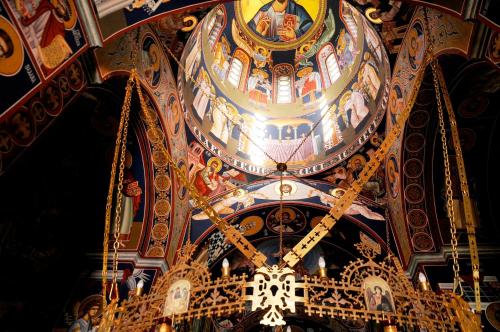 a ceiling of a building with paintings on it at Skupljen Resort: Enjoy the Freedom! in Vladimirci