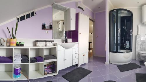 Ett badrum på Apartman Atelier