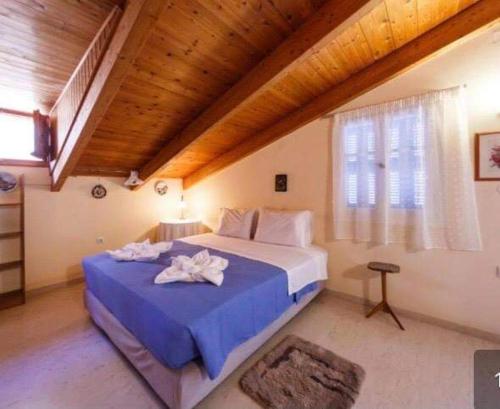 Postel nebo postele na pokoji v ubytování TERTSETI RESIDENCE