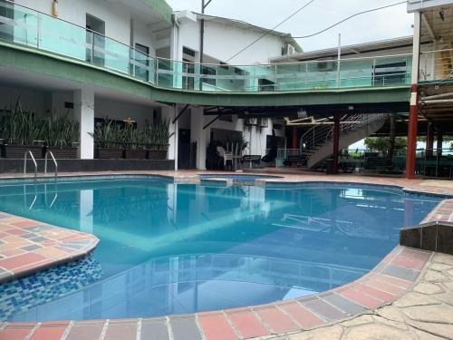 The swimming pool at or close to Hotel Chicala salgar
