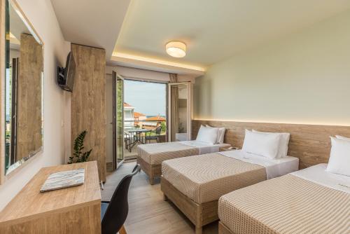 Posteľ alebo postele v izbe v ubytovaní Makris Luxury Rooms