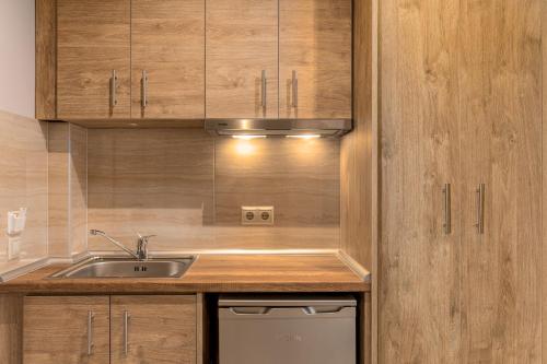 Kuchyňa alebo kuchynka v ubytovaní Makris Luxury Rooms