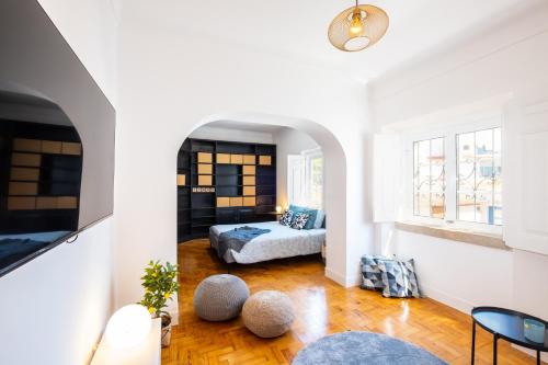 a bedroom with a bed in a white room at #049 Villa Lemon by Home Holidays in Albufeira
