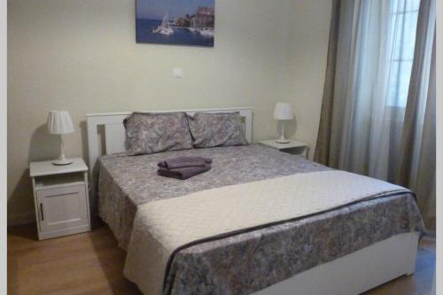 Кровать или кровати в номере ''Dei Vecchi'' apartment in Kerkyra