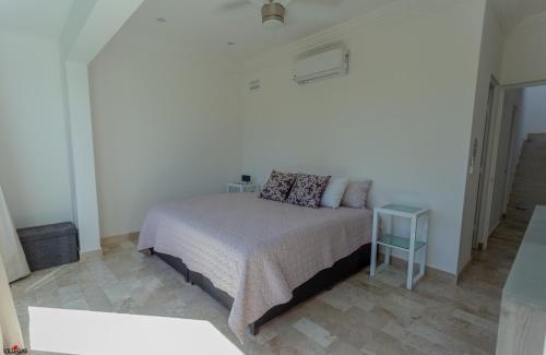 Katil atau katil-katil dalam bilik di Private Villa with Pool 10 min from Puerto Morelos Beach