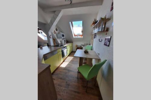 Kuchyň nebo kuchyňský kout v ubytování Ferienwohnung mit Elbwiesenblick