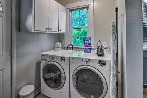 a laundry room with a washing machine and a sink at Cozy Birmingham Abode Less Than 7 Mi to Downtown Fun! in Birmingham