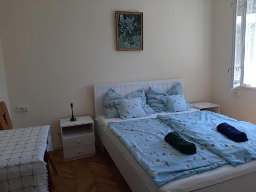 Posteľ alebo postele v izbe v ubytovaní Új Élet Weekend house