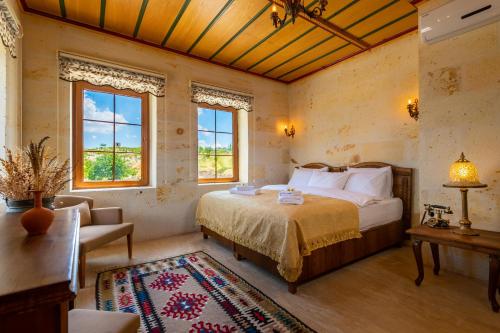 Postel nebo postele na pokoji v ubytování Esens Stone House