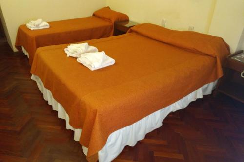 Ένα ή περισσότερα κρεβάτια σε δωμάτιο στο Crystal Hotel