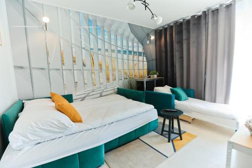 Posteľ alebo postele v izbe v ubytovaní M&K Apartamenty - Morska Przystań