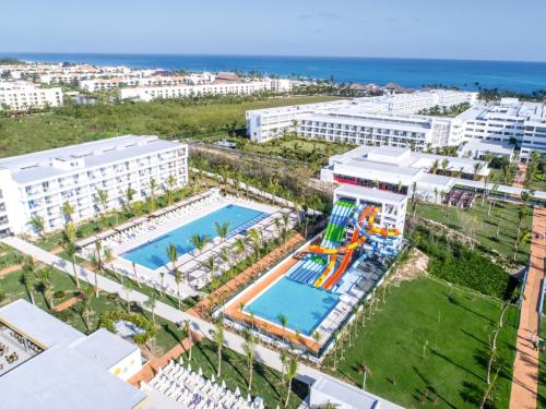 an aerial view of a resort with a swimming pool at Riu Republica - Adults Only - All Inclusive in Punta Cana