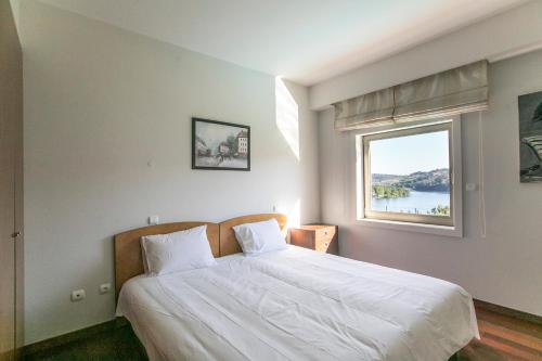 Ένα ή περισσότερα κρεβάτια σε δωμάτιο στο PRIVATE VILLA - Penafiel - Abragão