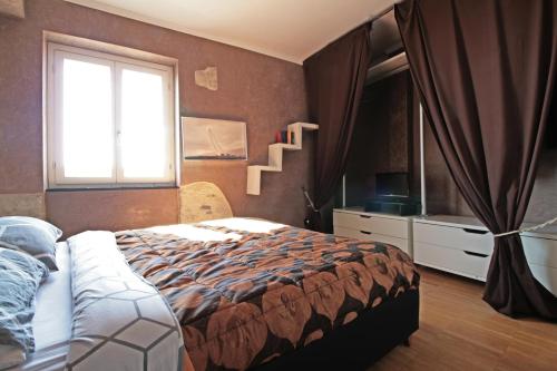 Postel nebo postele na pokoji v ubytování Albachiara home - vista mare