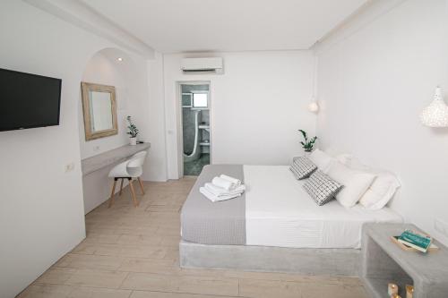 Ένα ή περισσότερα κρεβάτια σε δωμάτιο στο Sensia Luxury Studio with Hot tub