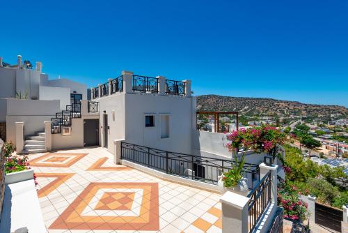 a view from the balcony of a house at Minois Boutique Hotel in Stalida
