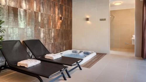 Ett badrum på Luxury Villa Subventus