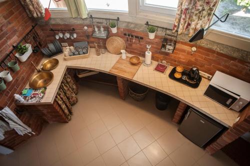 an overhead view of a kitchen with a counter top at Vienkiemis in Kretinga