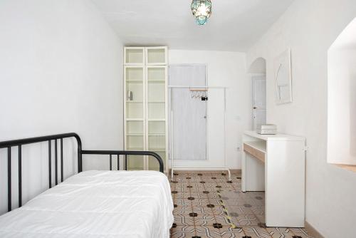 A bed or beds in a room at Precioso apartamento en Vejer con terraza