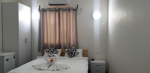 Postel nebo postele na pokoji v ubytování David Hameleh House
