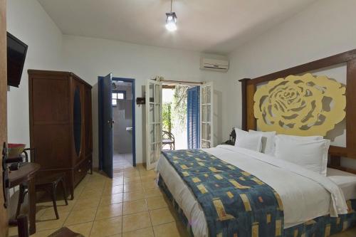 Katil atau katil-katil dalam bilik di Resort Fazenda 3 Pinheiros