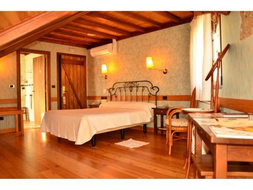 Ένα ή περισσότερα κρεβάτια σε δωμάτιο στο Casa Antiga Do Monte