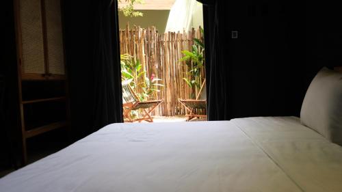 Katil atau katil-katil dalam bilik di Loba Tulum Male Only