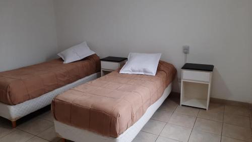 Ein Bett oder Betten in einem Zimmer der Unterkunft Q255 - Dpto PB zona residencial en Neuquen