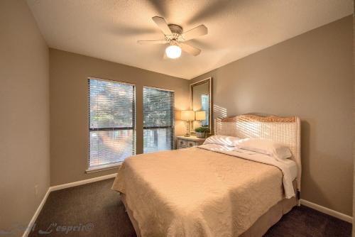 a bedroom with a bed and a ceiling fan at The Float Inn 3 CW B209 in New Braunfels