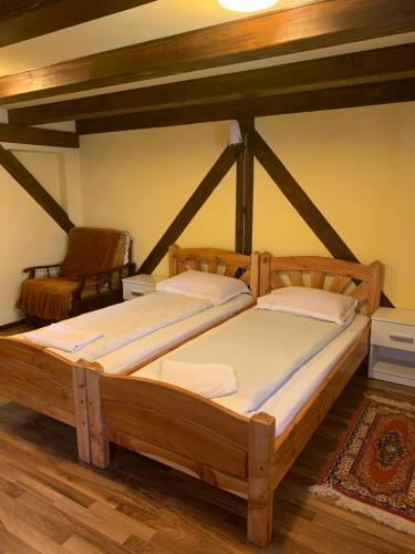 A bed or beds in a room at Casa Lenke