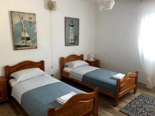 Posteľ alebo postele v izbe v ubytovaní Armstrong Apartments