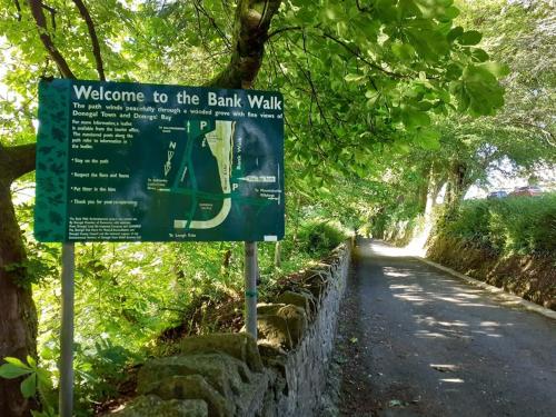 a sign on the side of a road at Tirchonaill Townhouse in Donegal