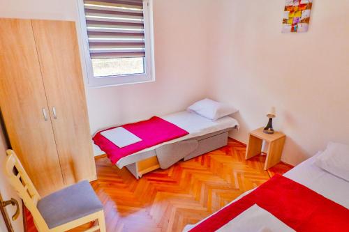 Ένα ή περισσότερα κρεβάτια σε δωμάτιο στο VIVANA HOUSE
