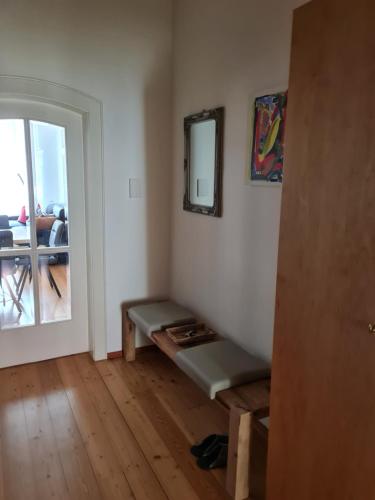 a room with a bench in the corner of a room at Altstadtjuwel mit Sauna in Sankt Veit an der Glan
