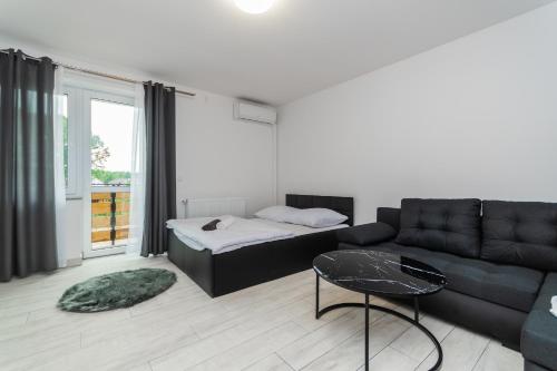 Posezení v ubytování VIP House Apartamenty