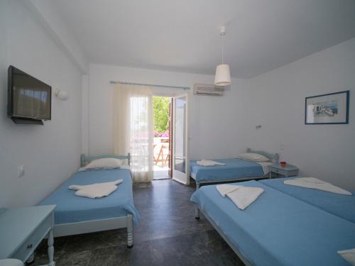 Tempat tidur dalam kamar di Karanasos
