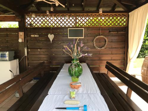 a table in a sauna with a vase on it at Villa Margherita in Montaquila