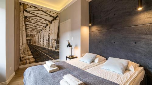 Una cama o camas en una habitación de hvile 119 Gdańsk - prywatne miejsce parkingowe