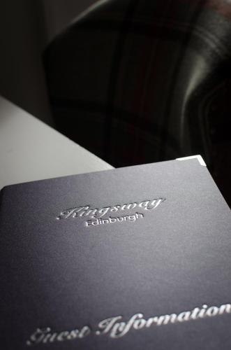 a card on top of a table with the wordulumulumulum at Kingsway Guest House in Edinburgh
