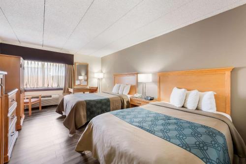 En eller flere senger på et rom på Econo Lodge Quakertown