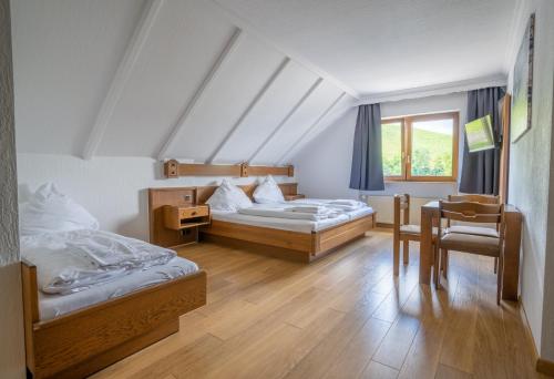 A bed or beds in a room at Mühlengarten by Relax Inn - Staffless & Self Check-In