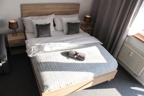 Postel nebo postele na pokoji v ubytování Apartmán MyMara 14