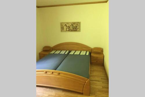 Katil atau katil-katil dalam bilik di Idyllisch Wohnen im Weserbergland - kompletter Bungalow auf eigenem Grundstück