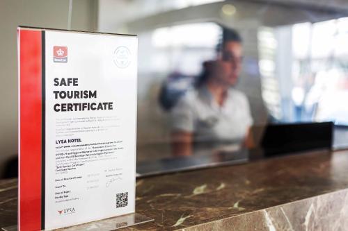 a sign that says safe townhuman centric on a counter at Marina Park Hotel in Istanbul