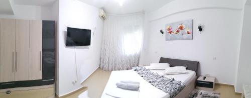 Cama o camas de una habitación en Apartament Mihai Summerland